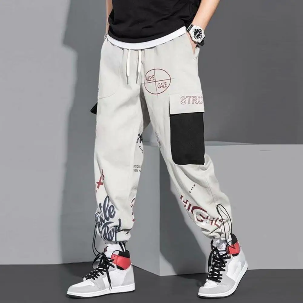 

Trendy Cargo Trousers Multiple Pockets Streetwear Male Relaxed Fit Ankle Tied Cargo Pants