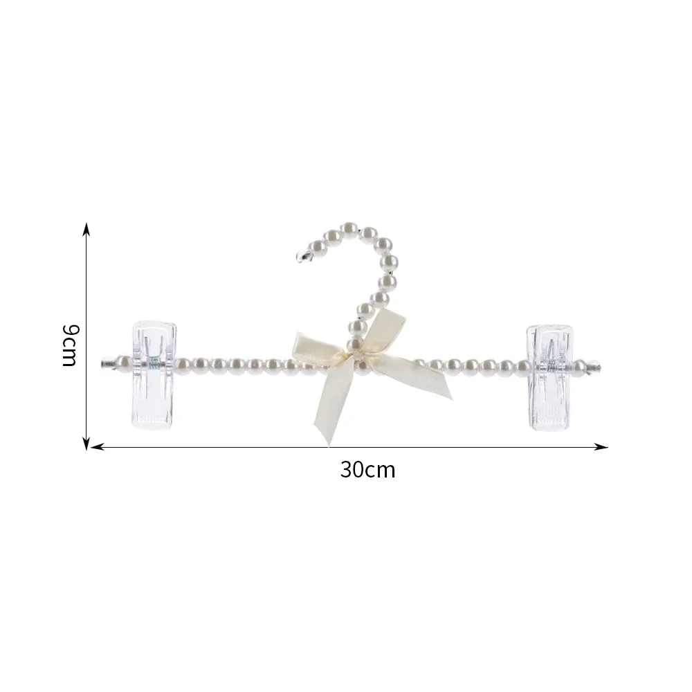 

Вешалка для одежды белая пластиковая 30 см