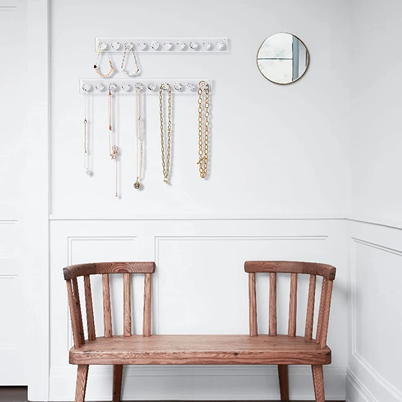 

Новая вешалка для ювелирных изделий, искусственная кожа, настенное крепление вешалка для ожерелья Органайзер с 10 крючками для ювелирных из...