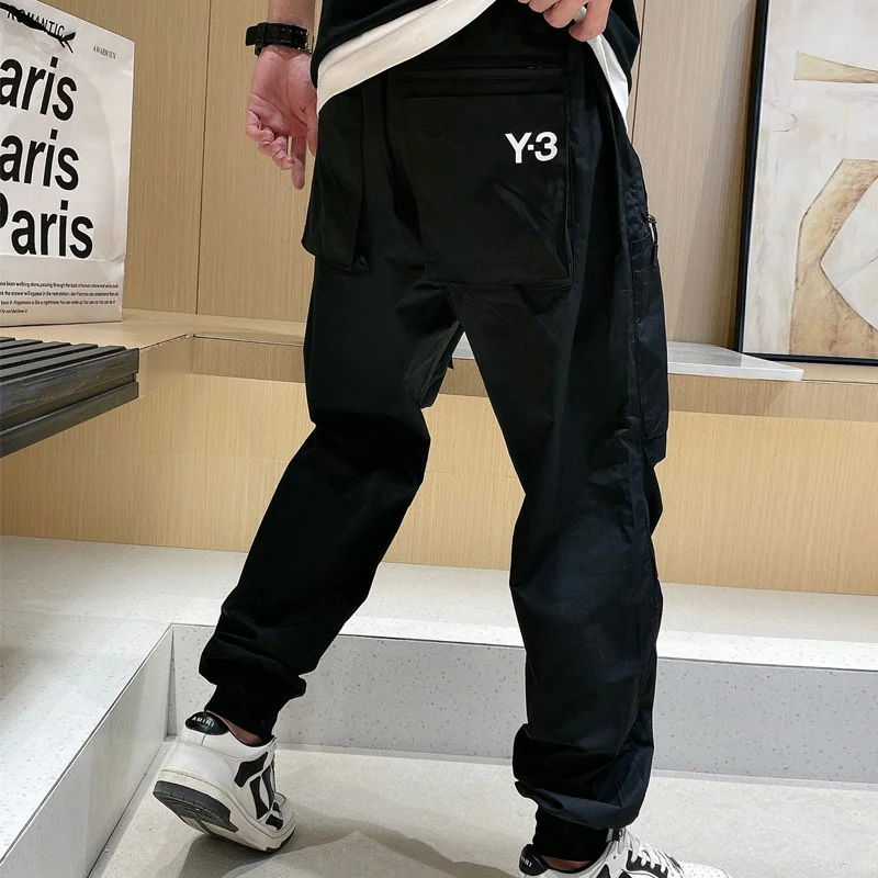 

Новинка, повседневные брюки-карго Yohji Yamamoto с карманами и принтом, летние Роскошные Брендовые мужские трендовые свободные брюки с пуговицами, спортивные брюки Y3