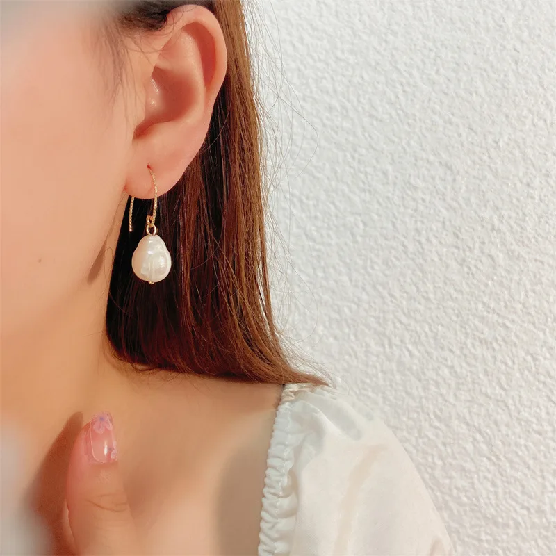 

European and American Irregular Pearl Earrings Earrings Female Ins Fashion Niche Design Ear Hook Ear Accessories Wholesale