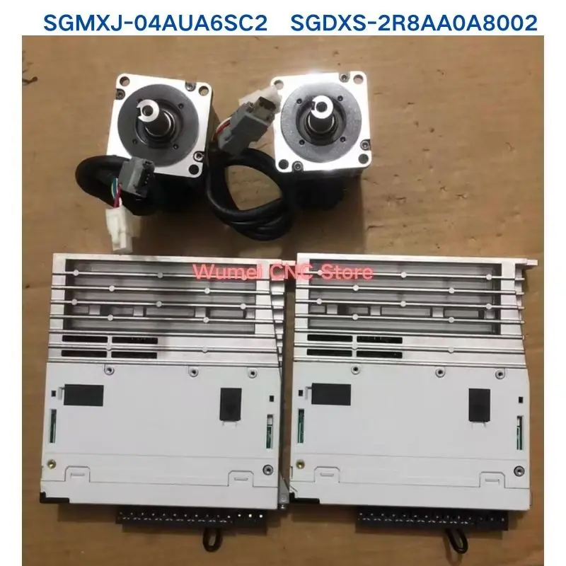 95% новый YASKAWA SGMXJ-04AUA6SC2+SGDXS-2R8AA0A8002 комплект