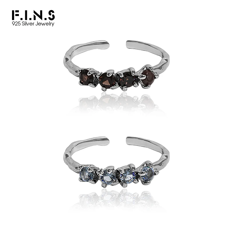 

Открытое кольцо из серебра 100% пробы с четырьмя фианитами