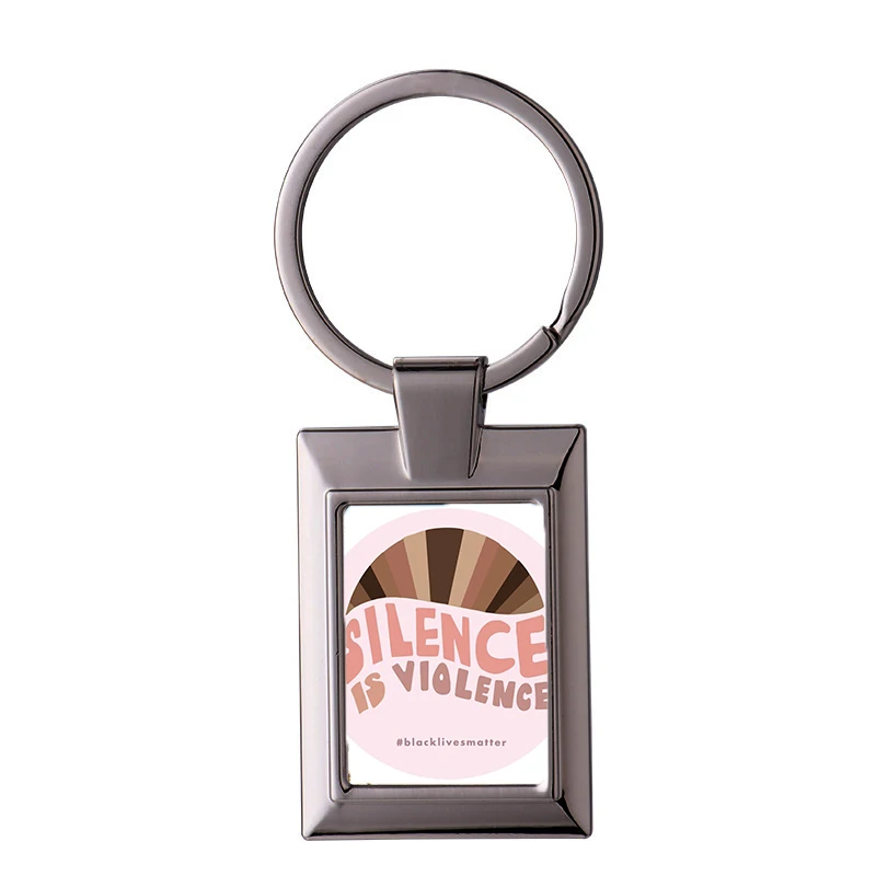 

Брелок для ключей с надписью «тишина-это насилие»