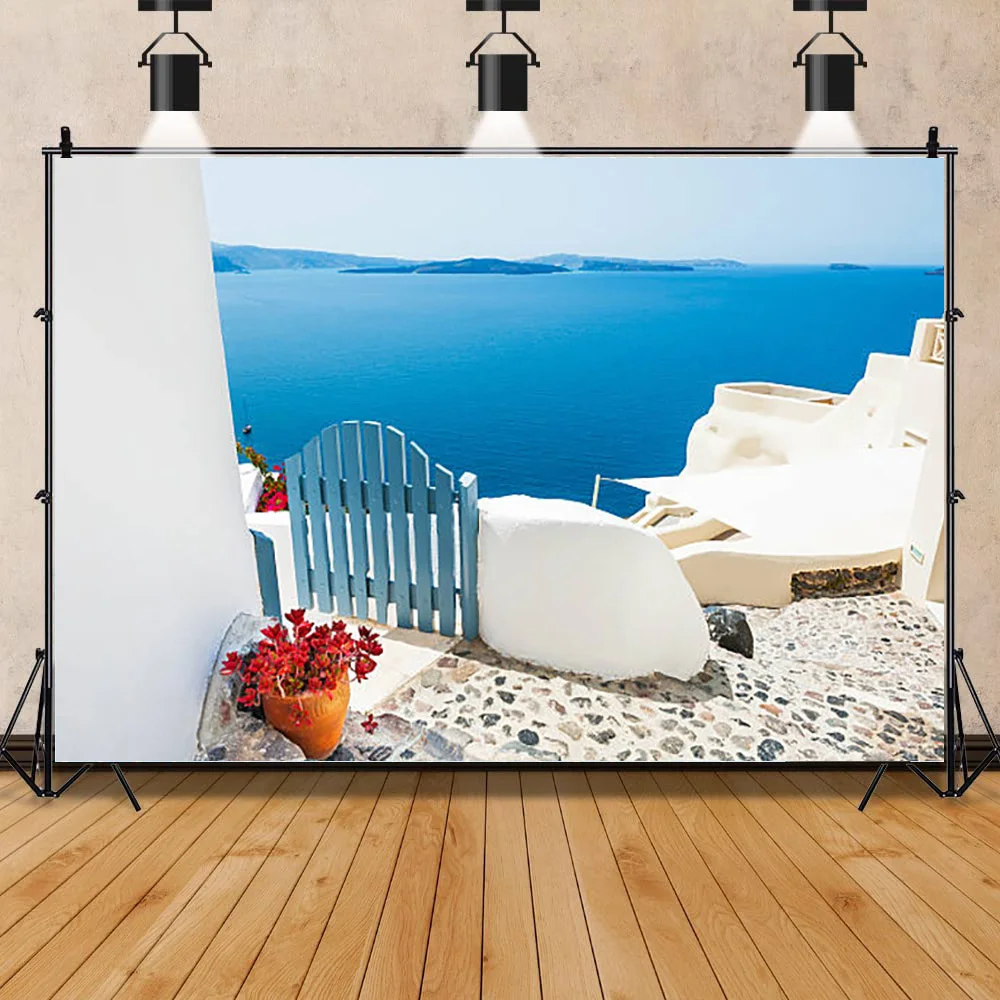 

Белые здания в старом городе остров Санторини и красивый пейзаж Эгейского моря фотографические Фотообои