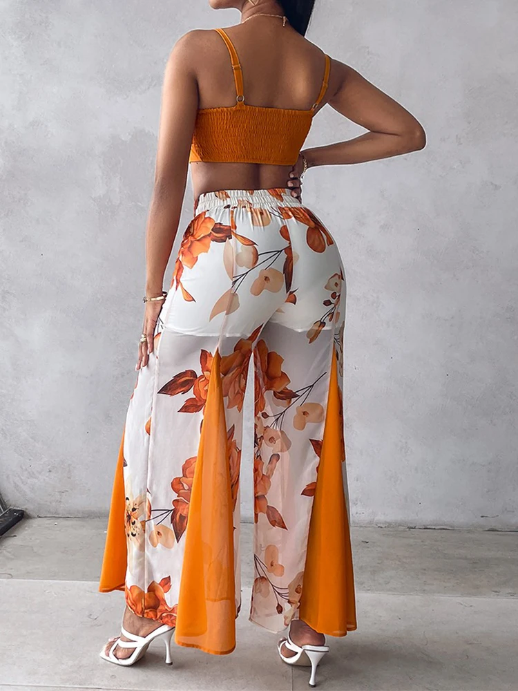 Топ на бретельках с рюшами и широкие брюки цветочным принтом