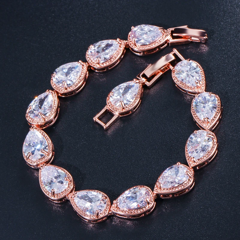 

ThreeGraces Brilliant Cubic Zirconia Rose Gold Color Bridal Wedding Engagement Bracelet for Women Fashion Party Jewelry BR346