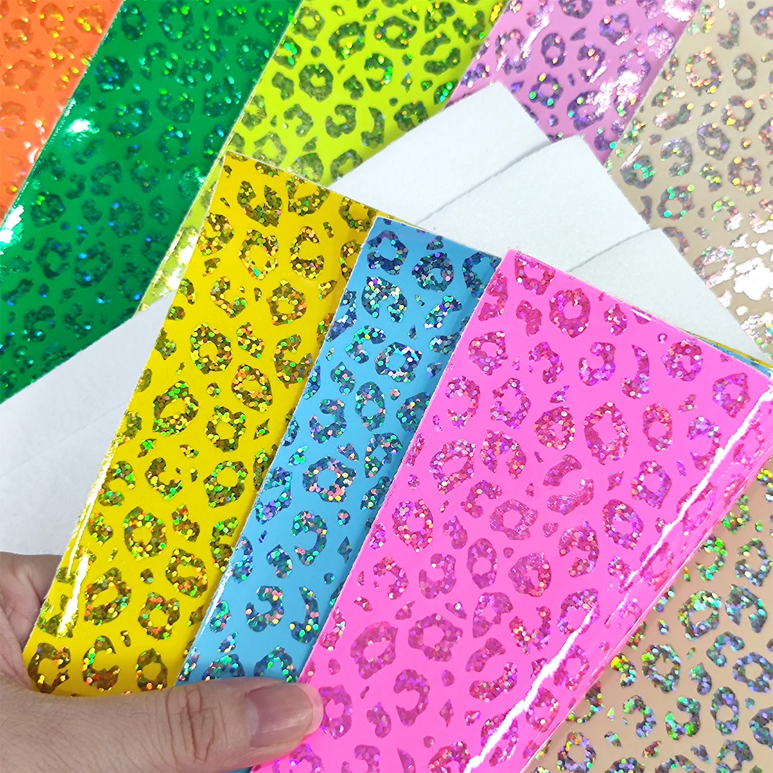 

Laser Glossy Leopard Holographic Iridescent PU Synthetic Fabric Faux Leather Sheets for Bags Handbags Making Bows DIY Materials