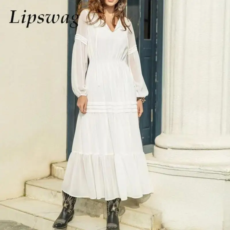 

Женское платье с V-образным вырезом и рукавами-фонариками