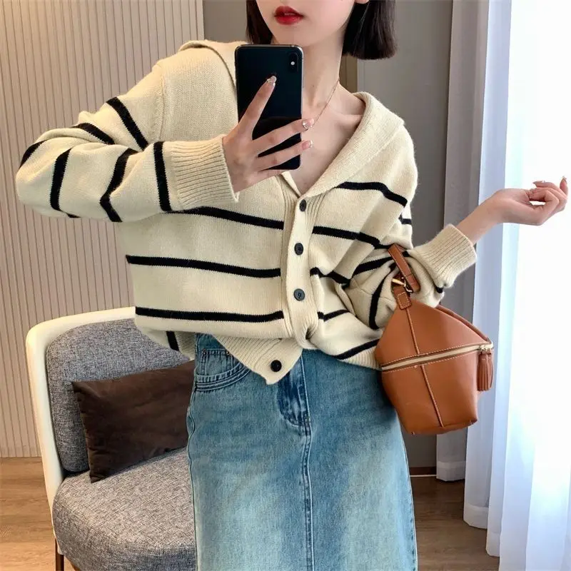 

Navy V-neck black and white striped sweater cardigan women autumn and winter long sleeve loose lapel knit cardigan sweater women