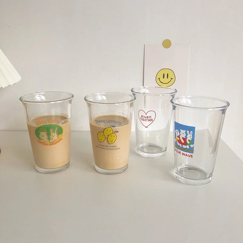 

Male and Female Students with The Same Glass Water Cup Illustration Cartoon Milk Coffee Cup Juice Breakfast Cup Home Drink Cup