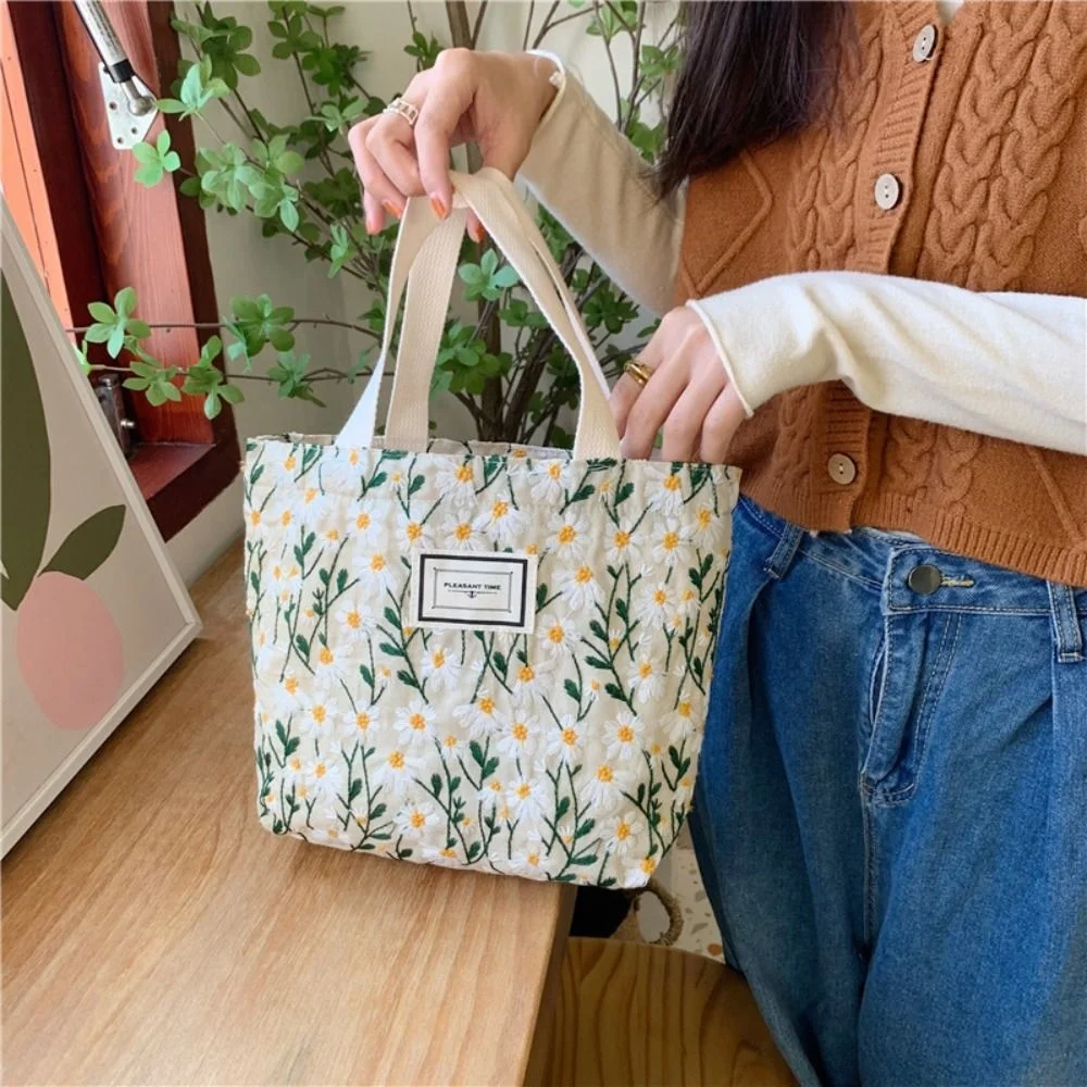 

High Quality Sweet Embroidered Canvas Handbag Snack Storage Mommy Bag Daisy Flower Sweet Embroidered Hand Carry Women's Bag