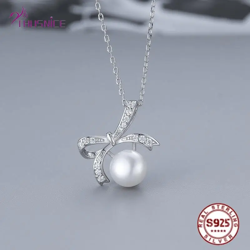 

Женское колье из серебра 100% пробы, с жемчугом