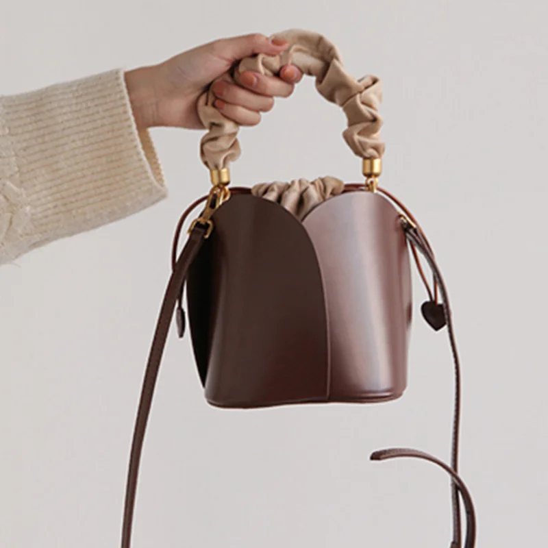 

Bucket bag niche design vegetable basket bag retro high-end petal leather handbag crossbody bag