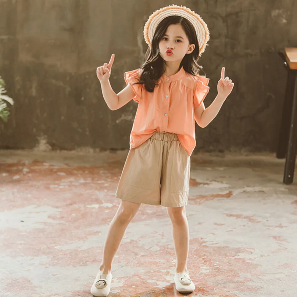 

Милый наряд с оборками для подростков, детский повседневный летний комплект одежды, новинка 2022, модная рубашка без рукавов и шорты для девоч...