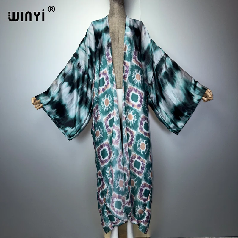 Фото Пляжное платье-кимоно WINYI в стиле бохо, макси-платье для отпуска, праздничное платье, абайя, роскошная одежда для мусульманок, модный кафтан с открытым передом в стиле Дубай. №1