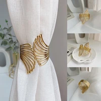 minimalistic light luxury curtain clip strap free punching metal light surface wings pattern buckle gold clips holder for home