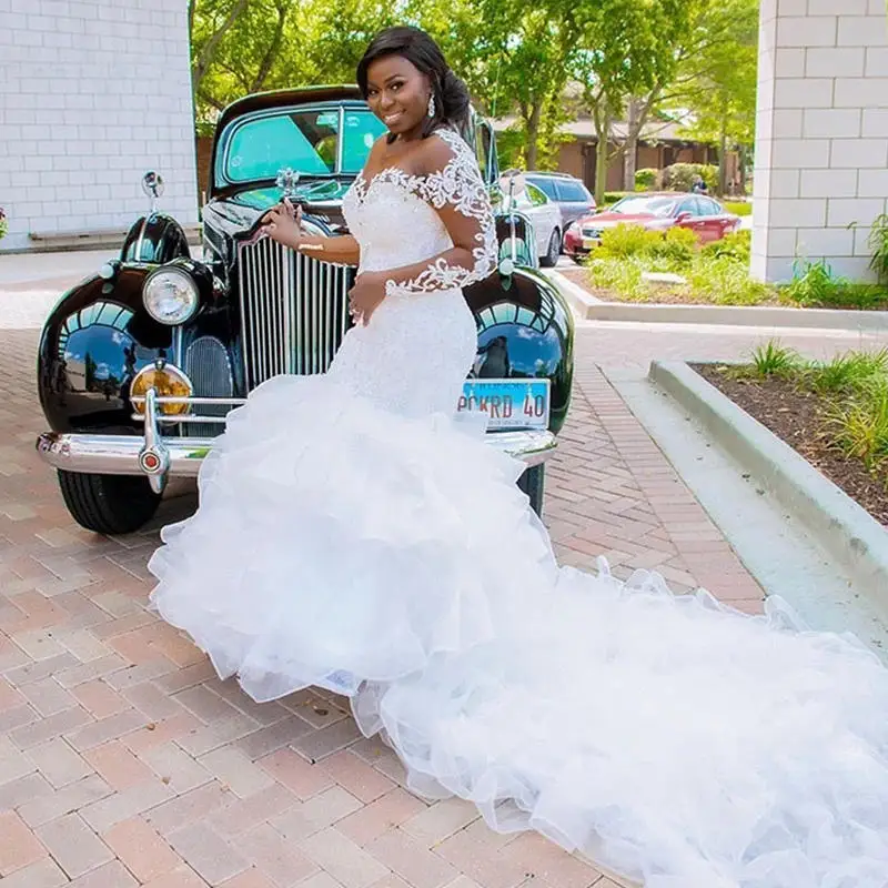 

Свадебные платья с длинным рукавом с оборками в африканском стиле Русалка из органзы с бусинами прозрачное женское платье с большим шлейфо...