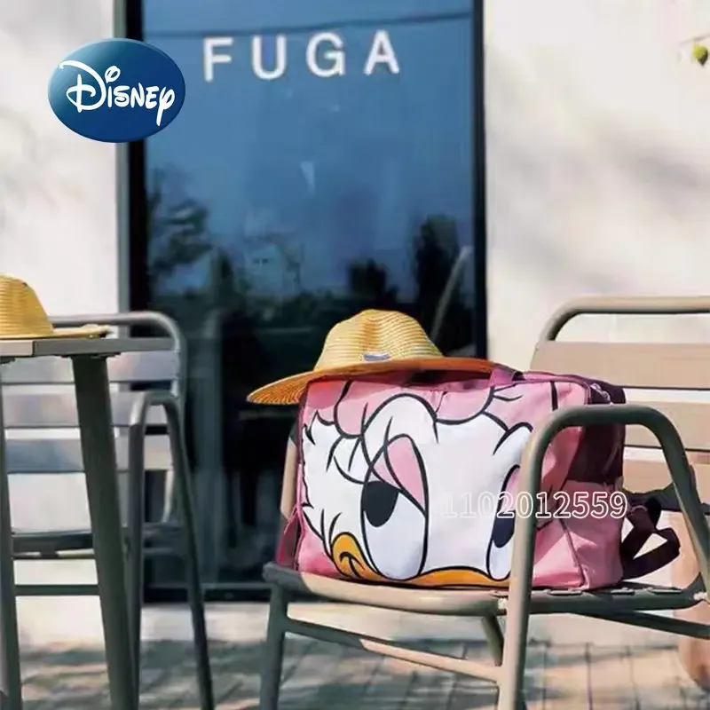 Фото Новая Женская дорожная сумка Disney «Дональд Дак», мультяшный портативный дорожный мешок, вместительная водонепроницаемая сумка для хранения №4