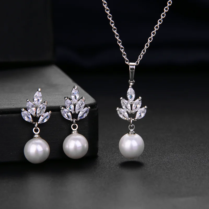 

Dubai Jewelry Sets Earrings Necklace for Women White Faux Pearl Leaf Zirconia Jewelry Set Luxury Can Wholesale Free Shipping