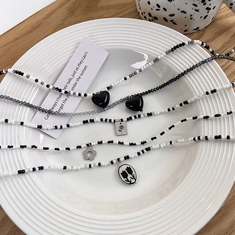 

Minar Textured Multi Styles Black White Contrasted Beaded Chain Choker Necklace Glass Heart Flower Pendant Necklaces for Women
