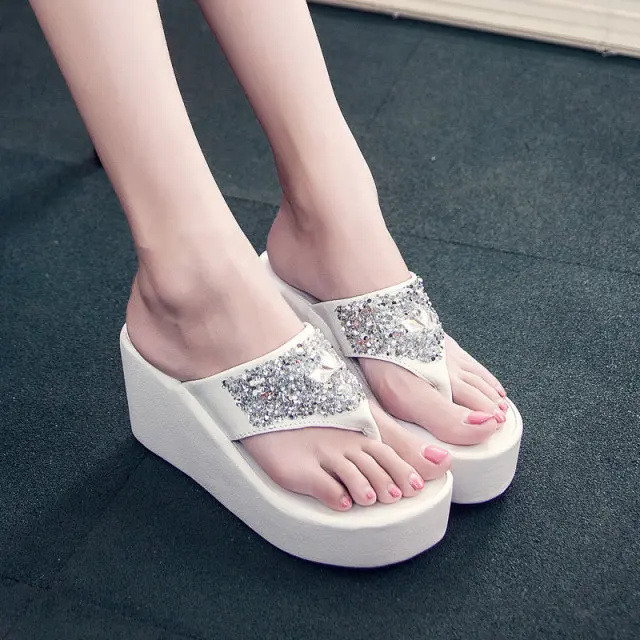 

Women's shoes Summer new Korean version of the rhinestone wedge with thick bottom sponge cake flip-flops beach sandals