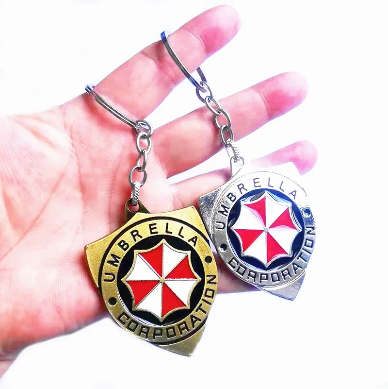 

Metal Red Protective Umbrella Keychains US Movie Residents-Evils Same Logo Keyring Car Decor Key Holder Backpack Pendant