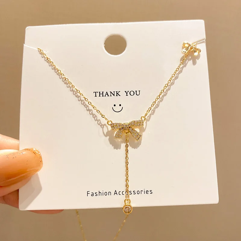 

New 2022 Bow Tassel Design Titanium Steel Necklace Women Light Luxury Pendant Choker