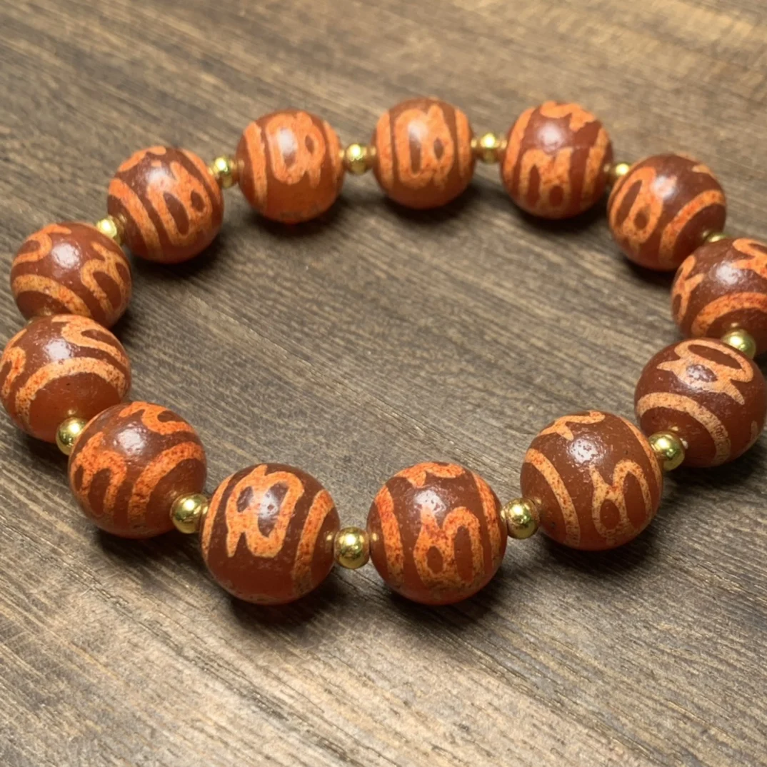 

Boutique style old agate full of cinnabar god of wealth dzi bracelet