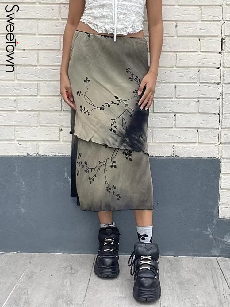 

Женская длинная юбка с заниженной талией и асимметричным подолом