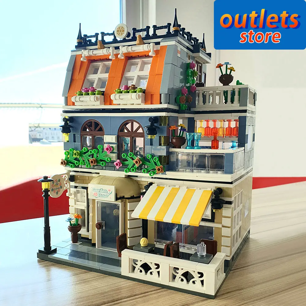 QL0940 креативный эксперт уличный вид сад модель отеля модульная Moc строительные блоки кирпичные игрушки Grand Emporium Pet Book Shop 1316 шт.