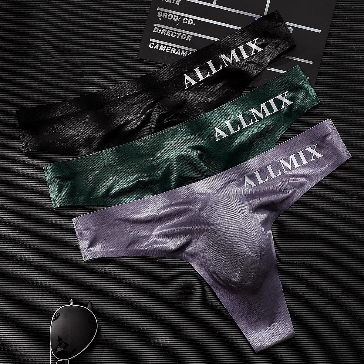 Foreign trade men's sexy sports fitness letter thin transparent buttocks ice silk low waist non-marking triangle single thong