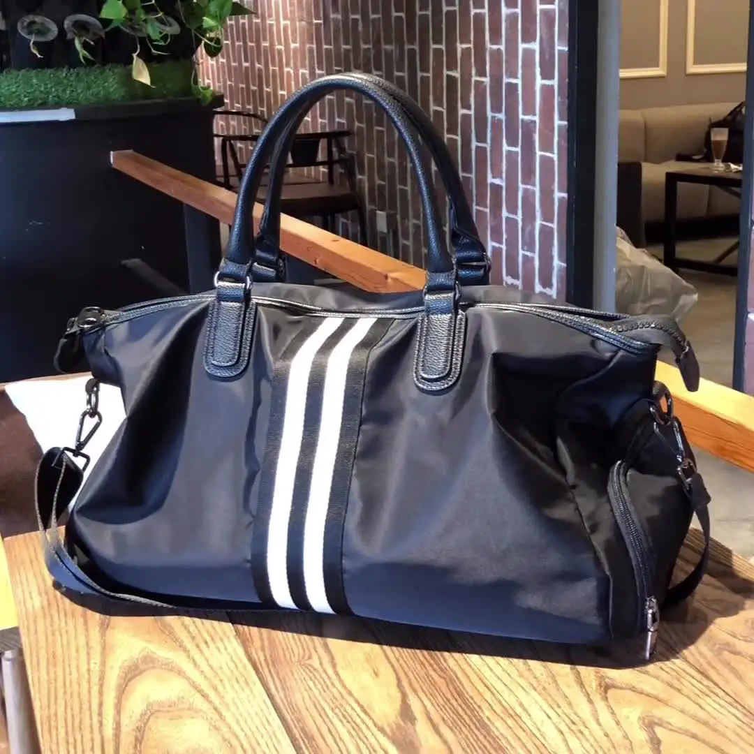 Han edition overnight bag bag large capacity travel luggage handbags for men and women dry wet depart gym bag