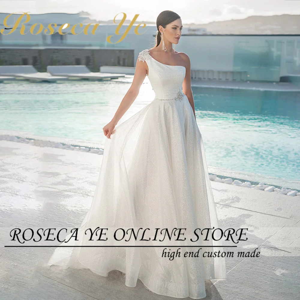 

Roseca Ye A-Line Wedding Dress 2022 One Shoulder Shining Crystal Beaded Elegant Backless Beach Bride Dresses Vestido De Noiva