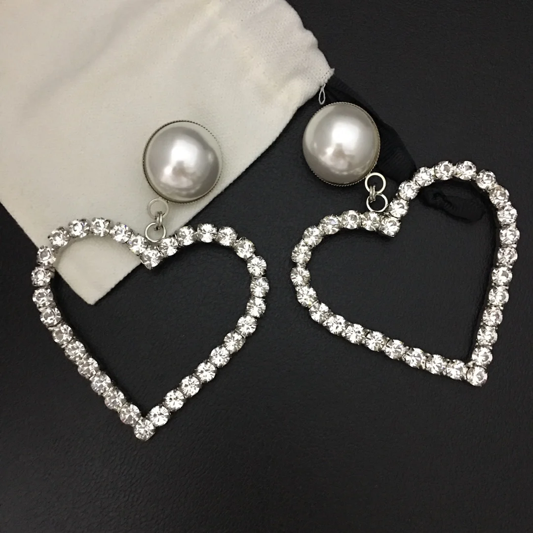 

European and American popular pearl big love ear clips