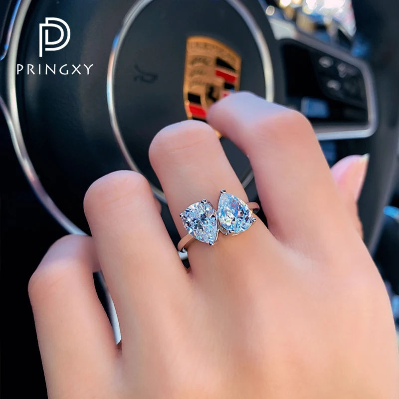 

PRINGXY супер крутое двойное кольцо с каплей из высокоуглеродистого бриллианта с тремя когтями модное кольцо из стерлингового серебра Имитаци...
