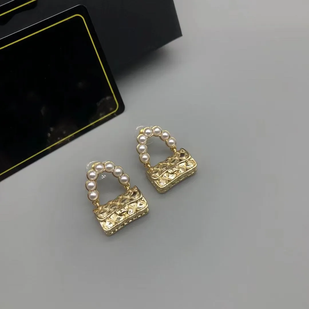 

Simple small bag fashion earrings
