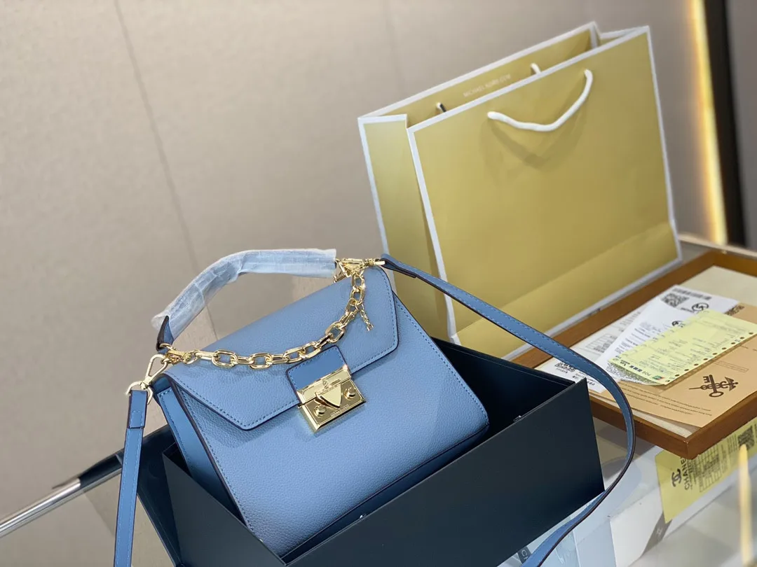 

2022 summer new fashion top-level pure cowhide candy color chain cross messenger hourglass bag portable cross messenger