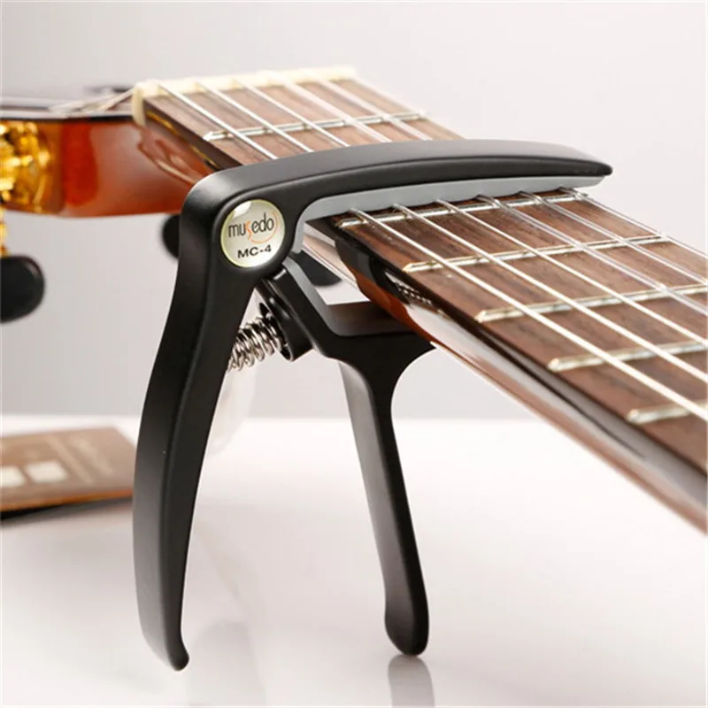 

Musedo MC-4 Soft Silica Metal Quick Change Clamp Key Guitar Capo designed for classic guitar