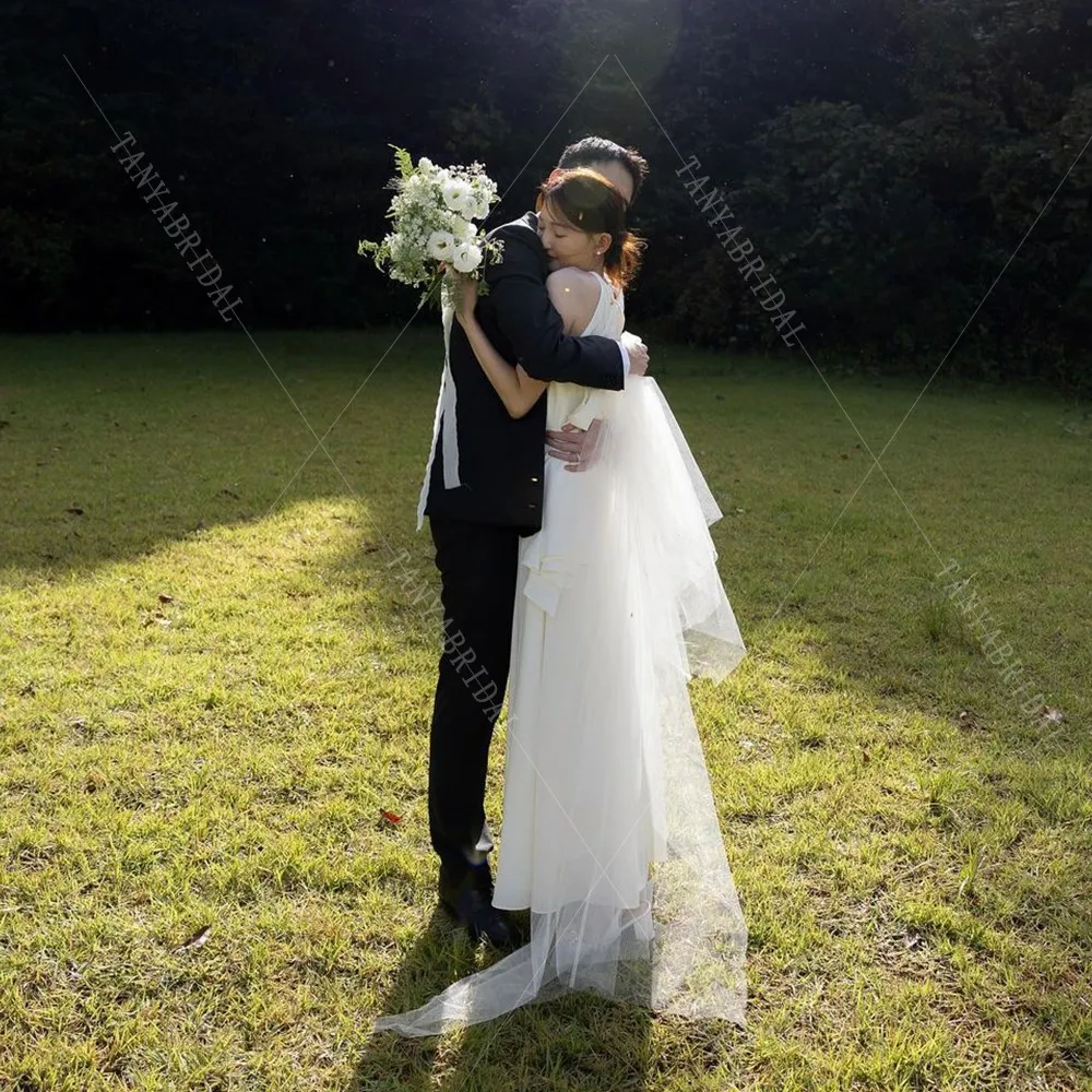 Простое свадебное платье без рукавов с круглым вырезом длиной до щиколотки