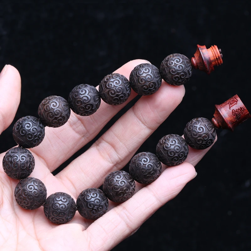 Браслет из натурального черного дерева бусины с узором в виде ключа