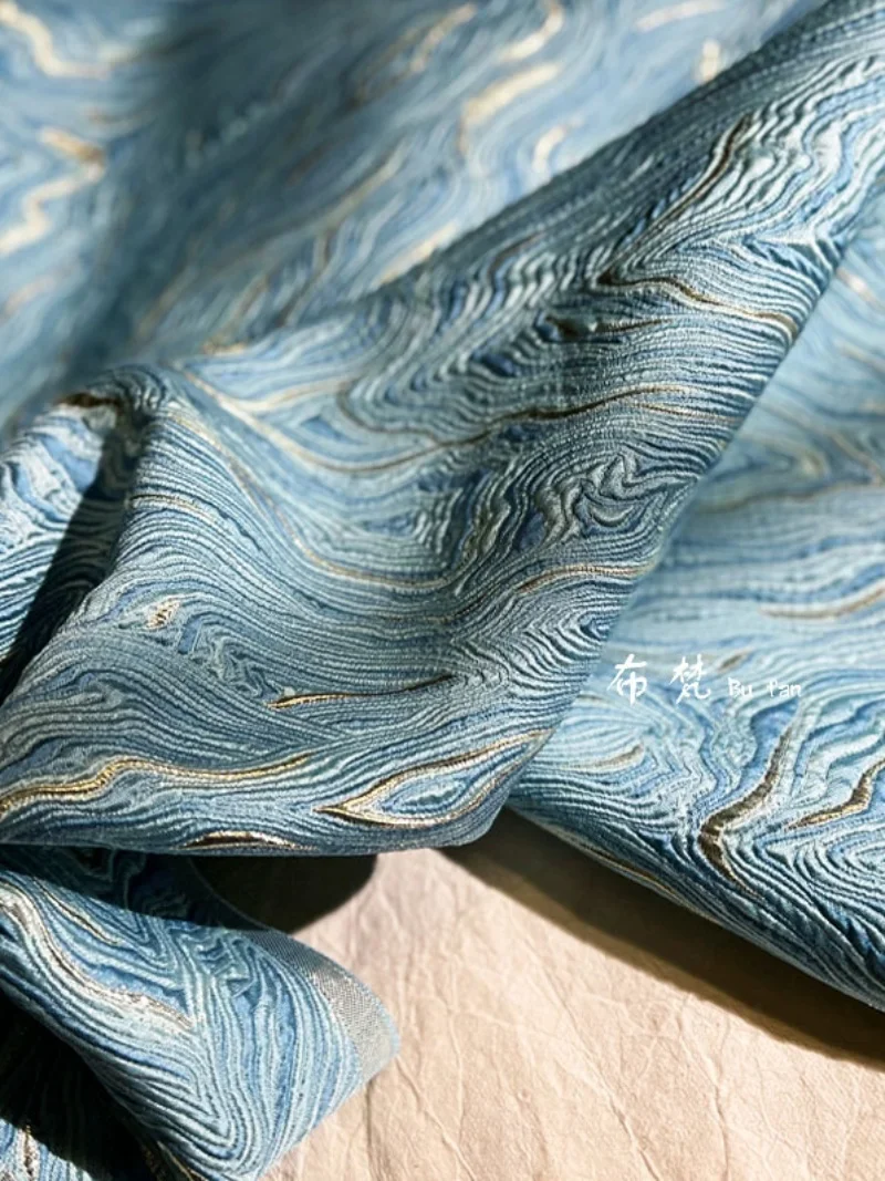 Трехмерная блестящая жаккардовая ткань синего цвета с текстурой океана