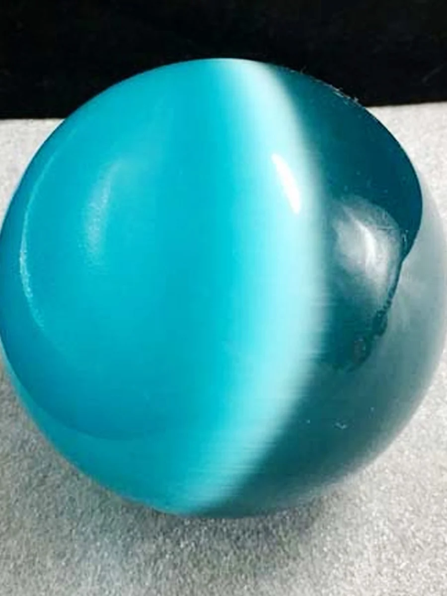 

Кристалл кошачий глаз 40 мм синего цвета