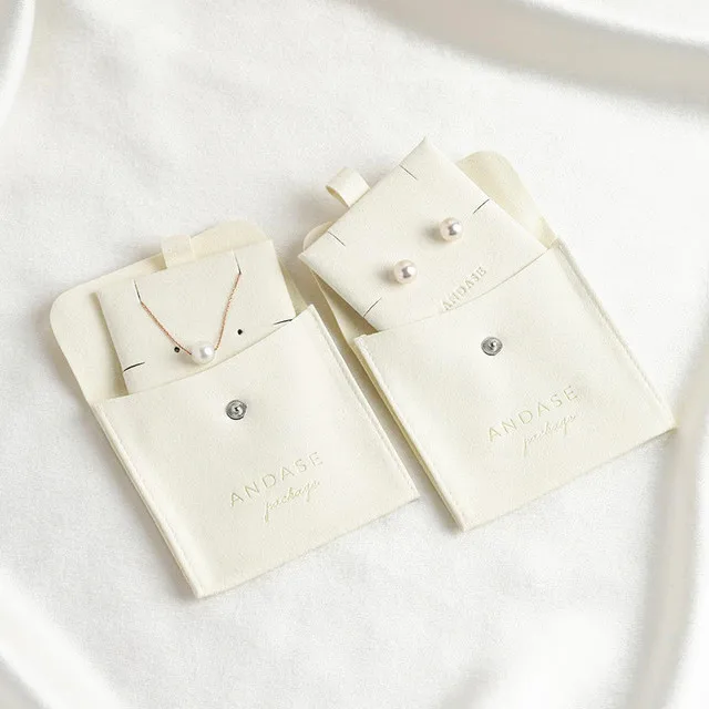 50/200 pieces white bag with buttons microfiber bag necklace earrings wholesale custom logo jewelry bagging brooch small bag