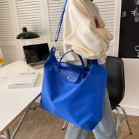 casual canvas large travel bag 2022 spring womens designer shoulder bags luxury brand shopping handheld crossbody shoulder bags