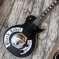 this is a professional 6 string electric guitar with black skull painted body beautiful sound free postage to home