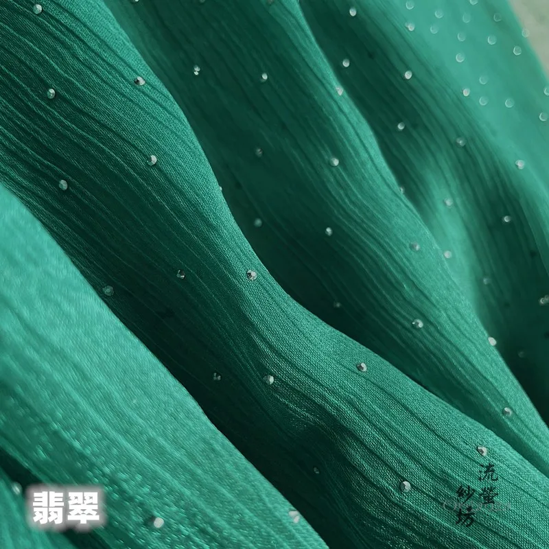 Тёмно-синяя блестящая ткань из органзы с эффектом сверления