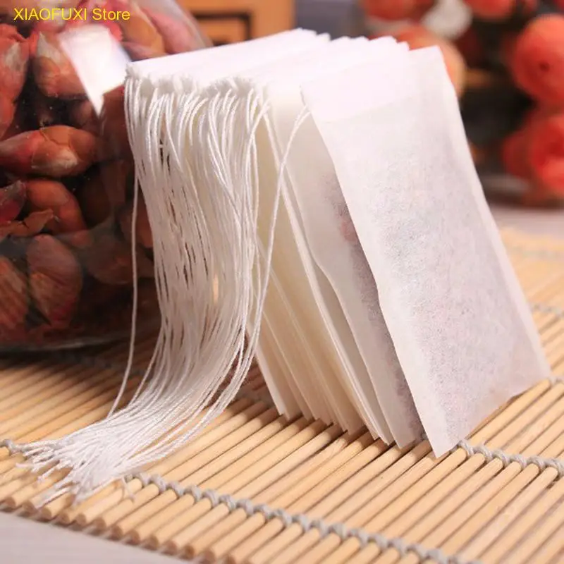 

Hot Sale 100pcs Non Woven Empty Tea Bags String Seal Filter Herb Loose Disposable Tea Bags Convenient Essential Tools F0010