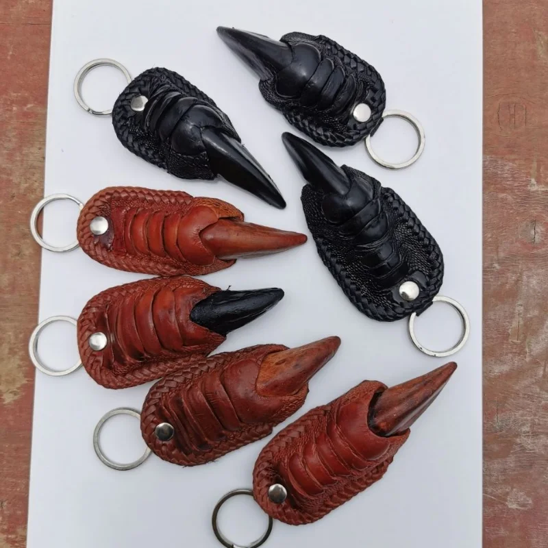 

Ostrich nail key pendant is a natural and handmade rare item home decor sculpture statues for decoration