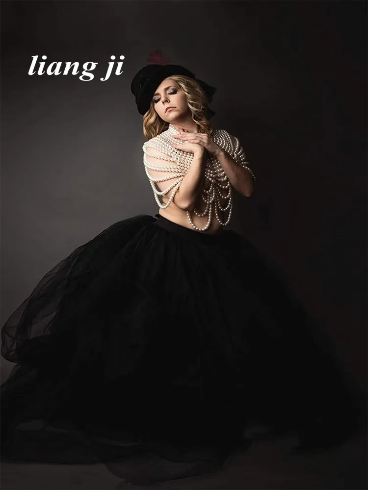 Женская цепочка с бусинами средней длины жемчугом |